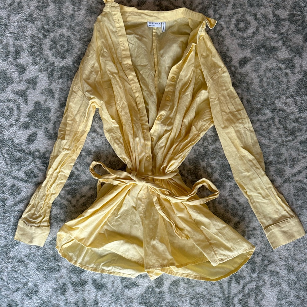 Size 4 ASOS yellow romper. Worn once. Comes with tie belt